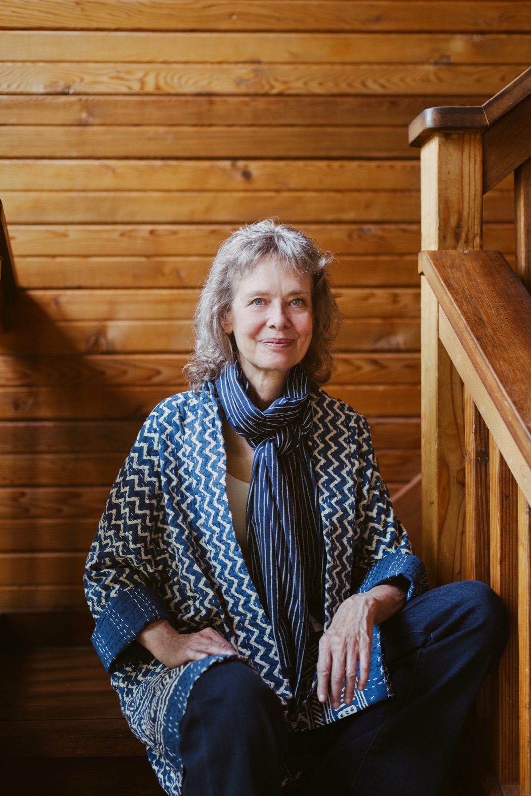 Connirae Andreas, seated, looking toward the camera